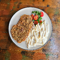 Milanesa com Penne Limone