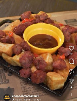 Porção Linguiça artesanal com Mandioca Frita