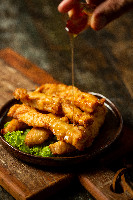 Tira de Frango Empanado com Gengibre (200 Grs)