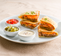 Arais kafta com especiarias e tomate assado.