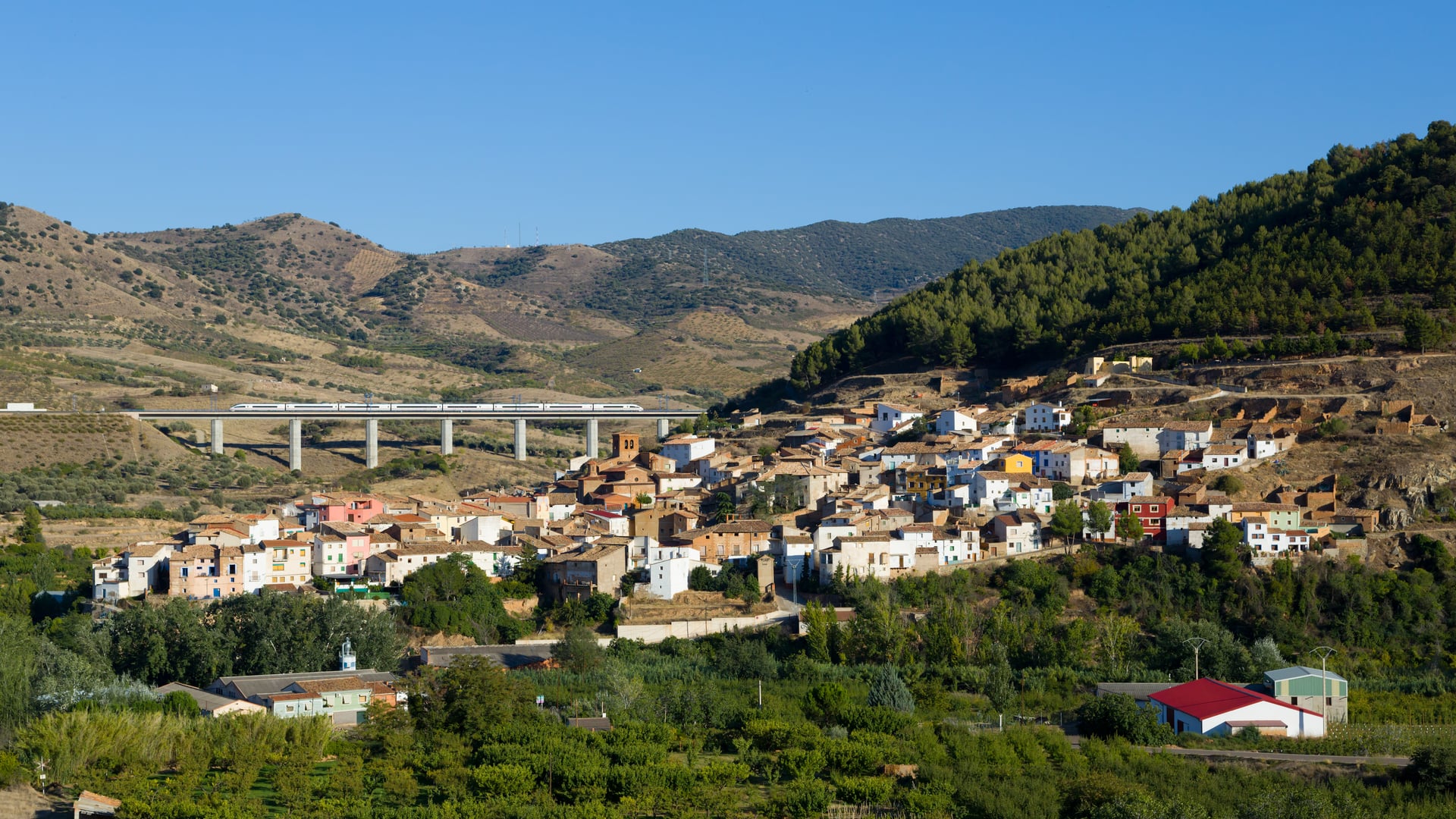 High-speed rail viaduct traversing regional landscapes, unlocking connectivity and property value