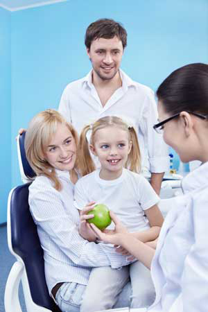 Family at the Dentist practicing general dentistry