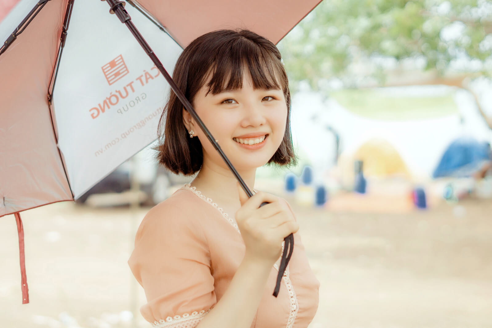 woman smiling in a street