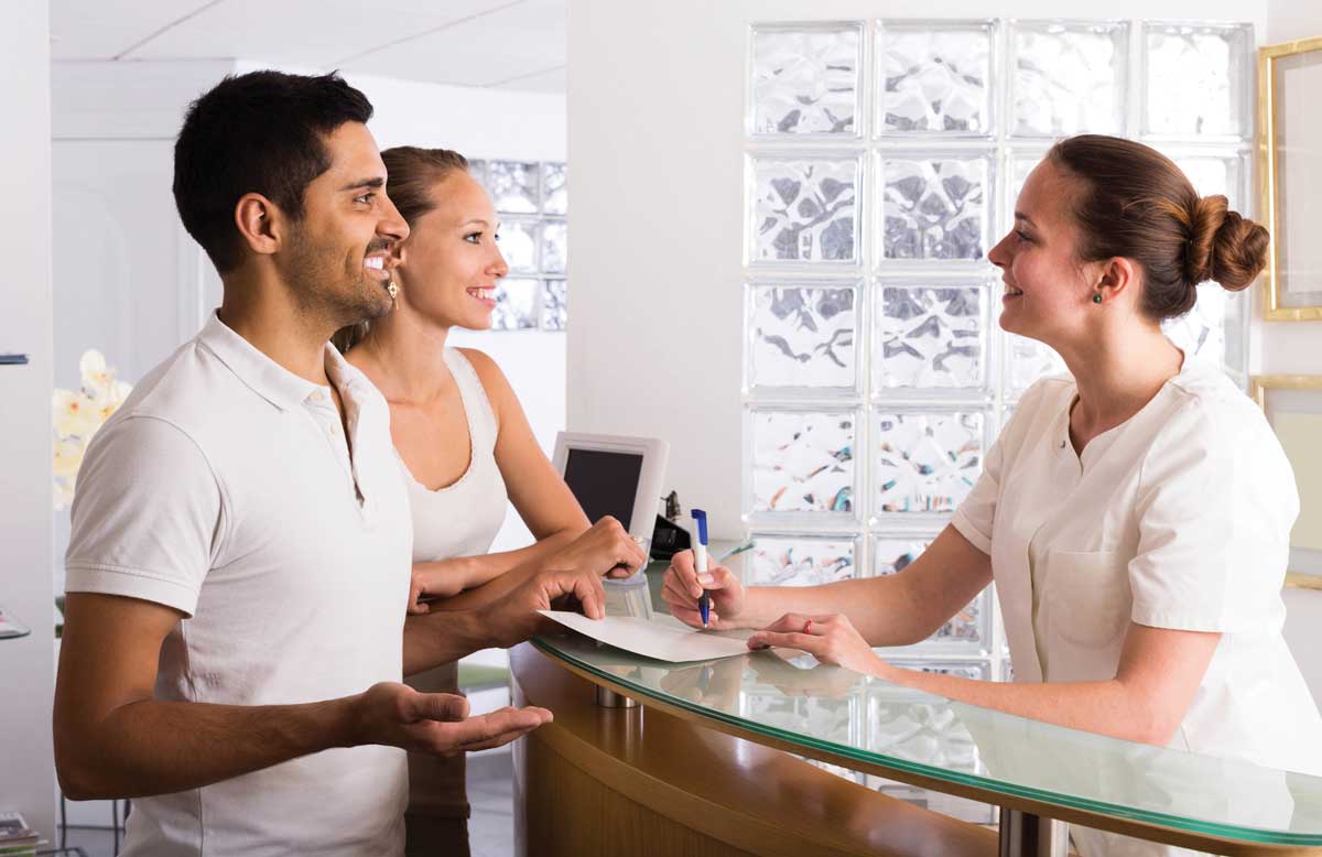 New patients at the front desk.