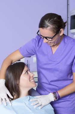 patient happily discussing with dentist