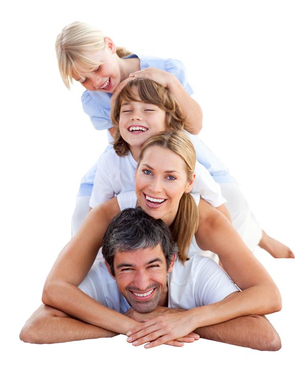 family in a dog-pile smiling