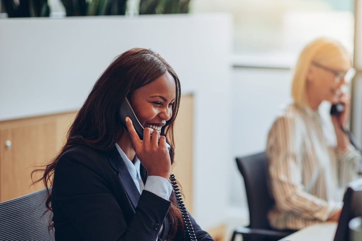 A receptionist answering the phone.