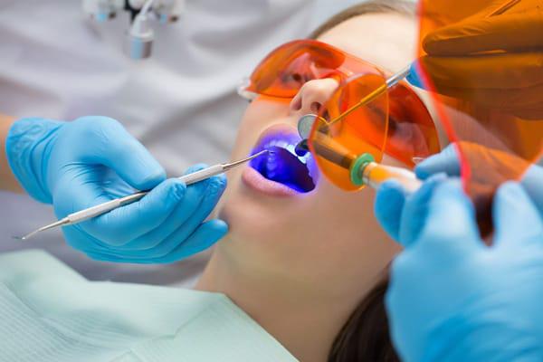 girl getting a composite filling