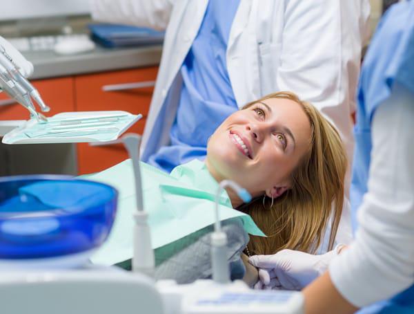 woman getting wisdom teeth extracted