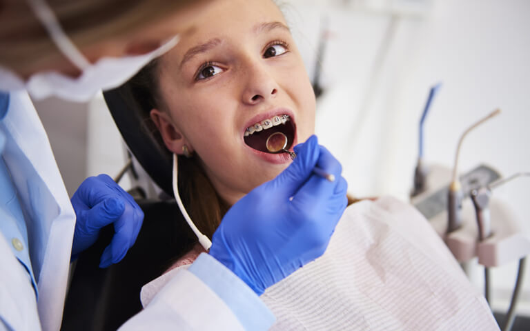 child with dentist