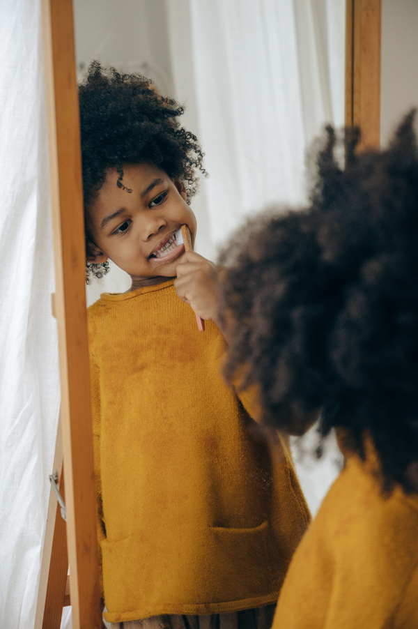 Kid brushing teeth