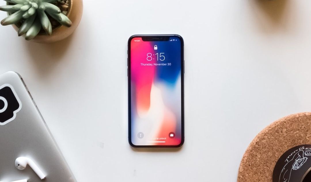 featured image - Designing for iPhone X Screen Dimensions: 9 Tips for a Great UX