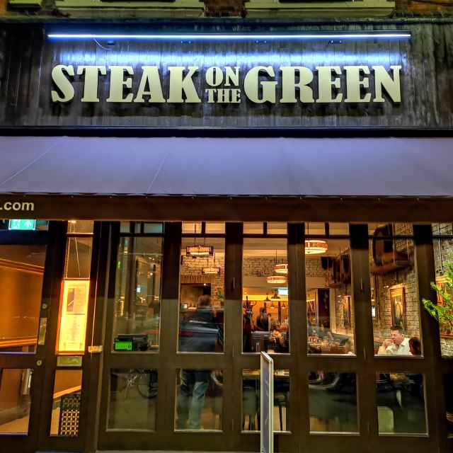 Steak on the Green logo