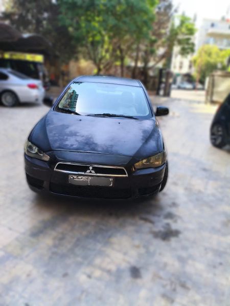 Mitsubishi Lancer 2009/2010 مالك واحد من الوكالة