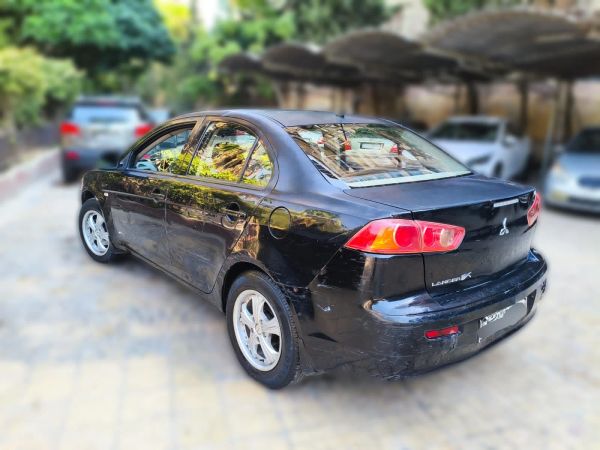 Mitsubishi Lancer 2009/2010 مالك واحد من الوكالة