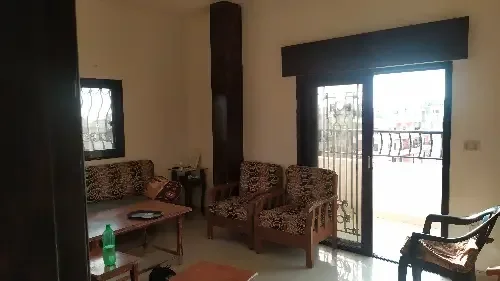 شقة للبيع بمنطقة سكنية هادئة