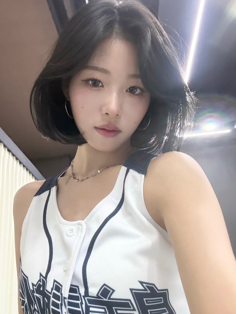 Short dark cut with wispy bangs