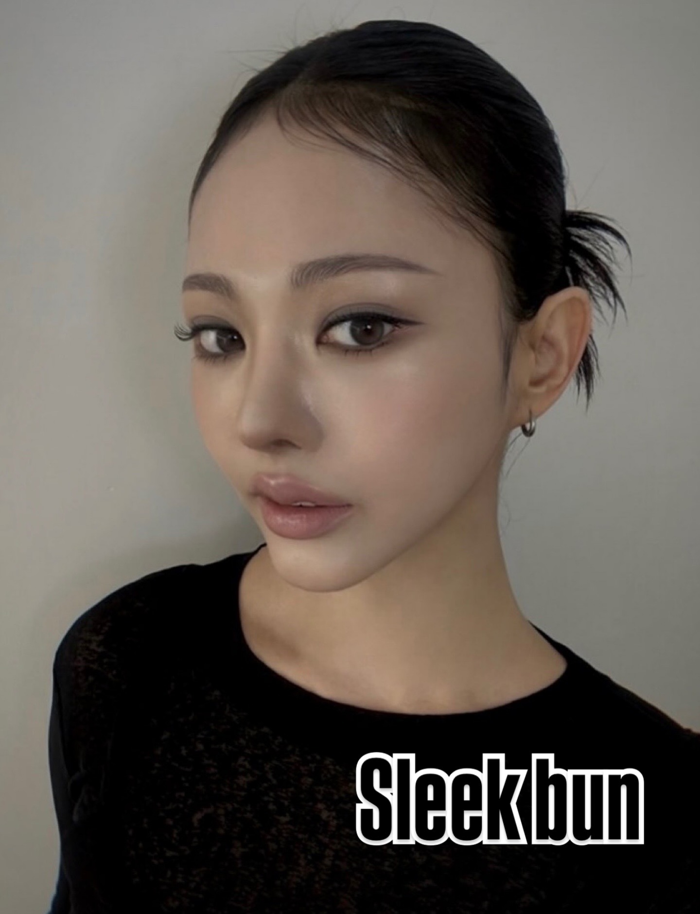 Sleek low bun, clean and chic