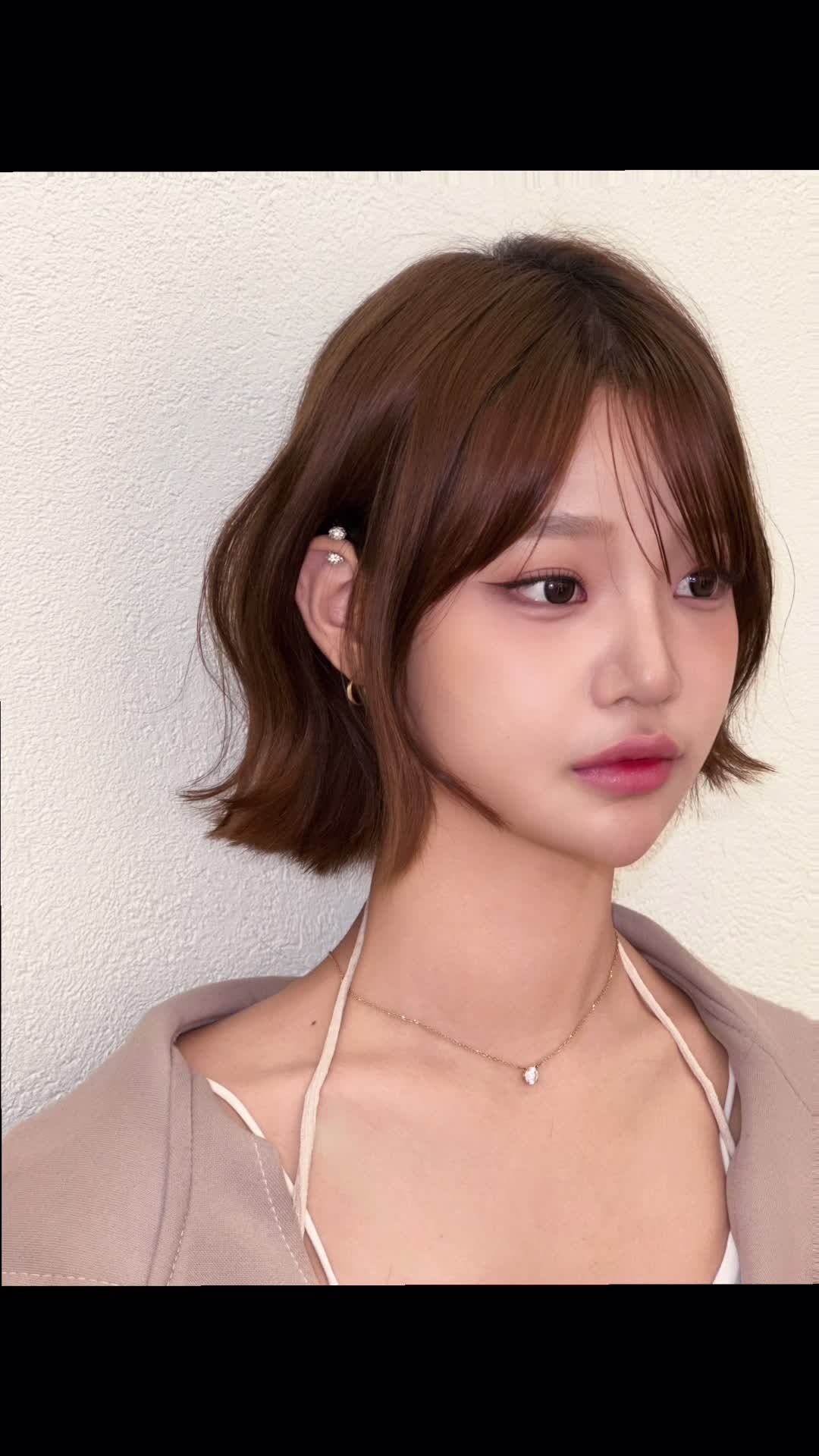 Short brown bob with bangs
