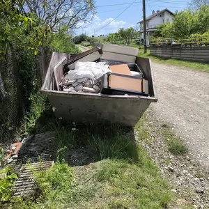 Къртене, чистене и извозване на строителни отпадъци.