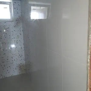 Монтаж на гранитогрес по стени, вкл.фугиране