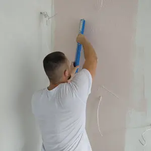 Полагане на фина шпакловка (шийтрок) по стени