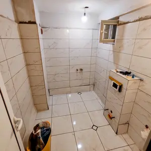 Монтаж на гранитогрес по стени, вкл.фугиране