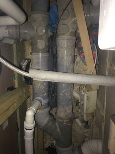 Internal waste buildup cleared from ground floor WC pipe.