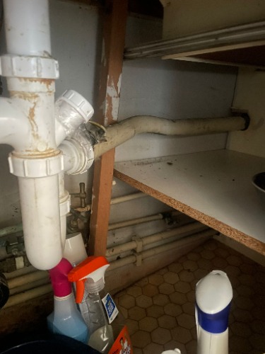 Electro-mechanical cleaning of internal waste pipework in Bethnal Green, London.