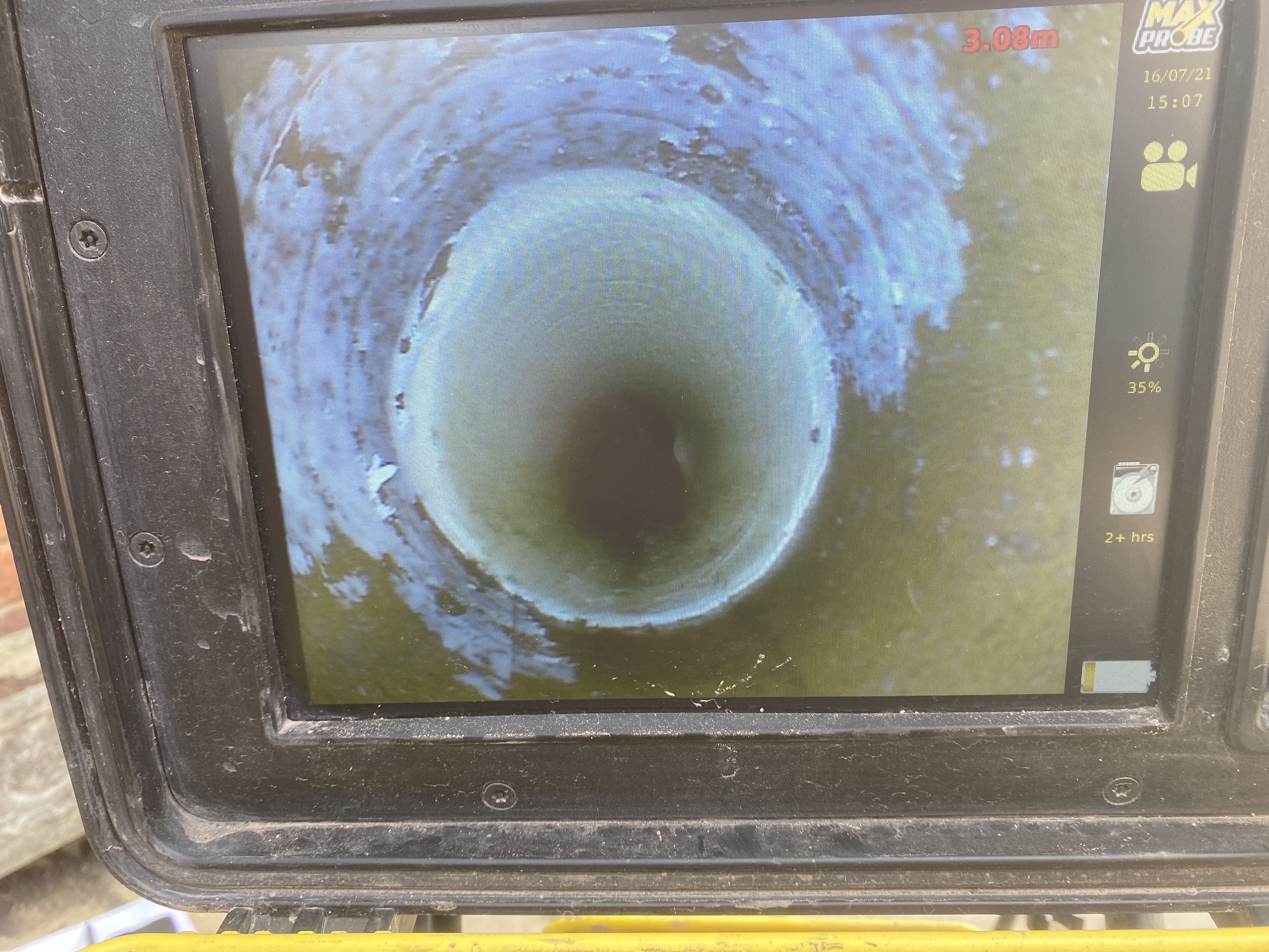 Completed patch repair installed within the drain