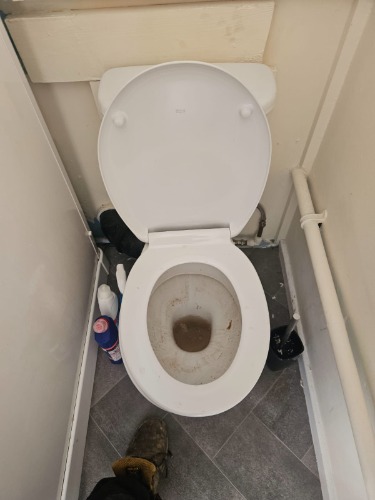 Toilet blockage attendance at a Wivenhoe property prior to rodding clearance.