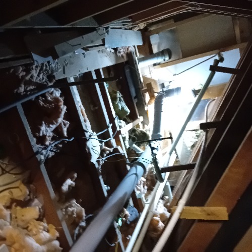Horizontal soil vent pipe cleared within a loft space in Kidlington following mechanical cleaning.