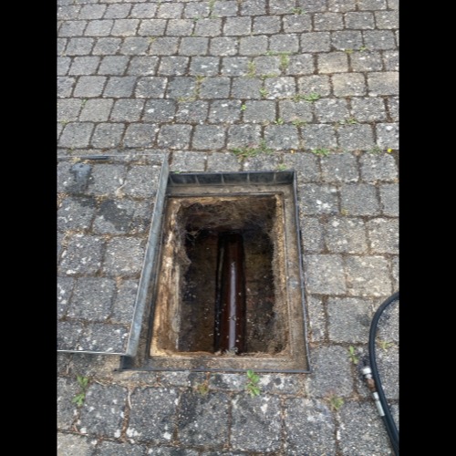Front inspection chamber accessed in St Albans prior to high-pressure jetting of the foul drain.