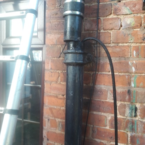Blocked gully inspected in Walsall prior to clearance works.