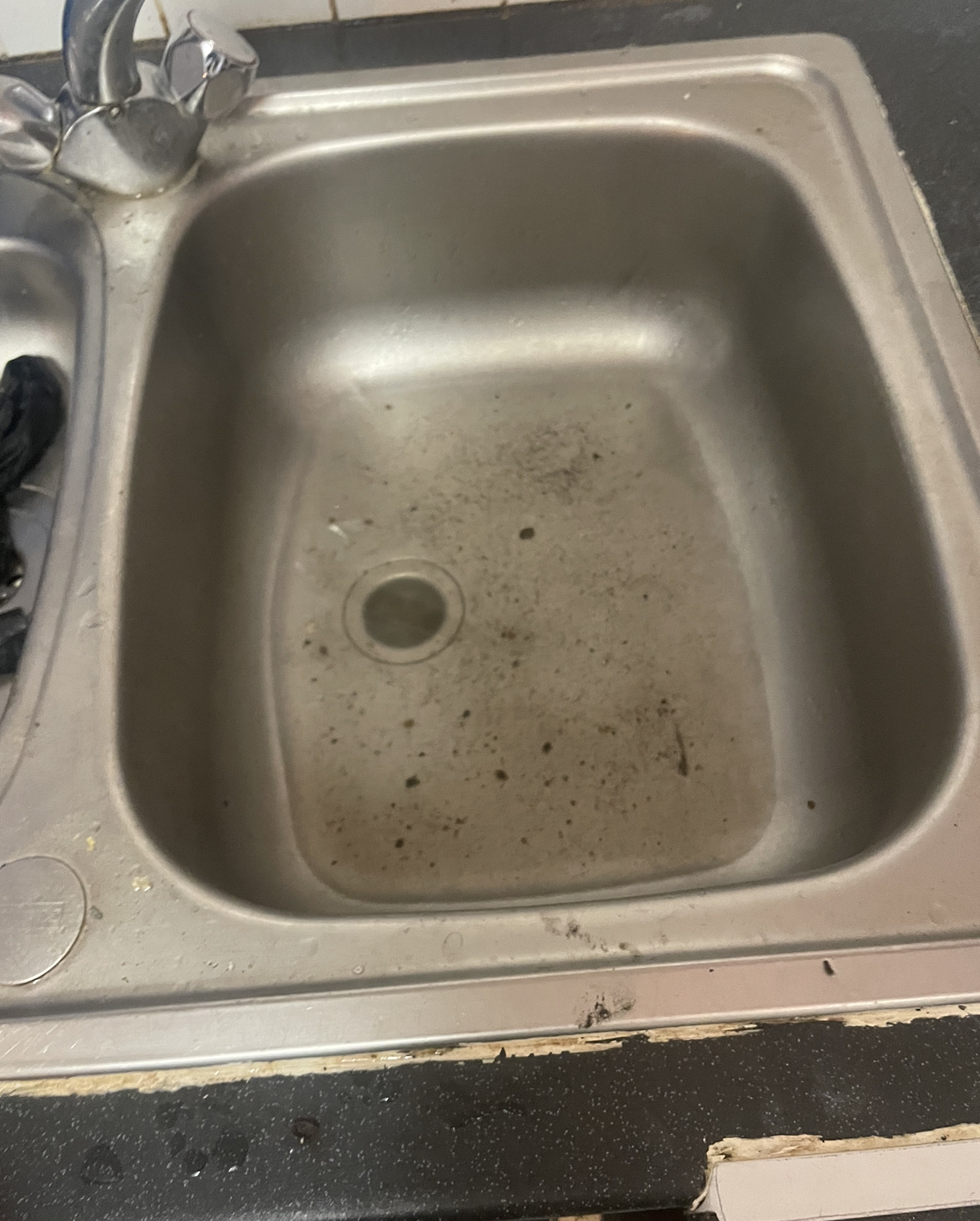 Blocked sink investigated in Stoke Newington prior to clearance works.