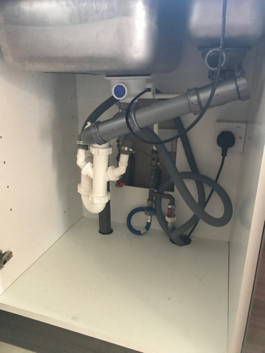 Kitchen waste pipe showing limited fall at a property in Windsor (SL4).
