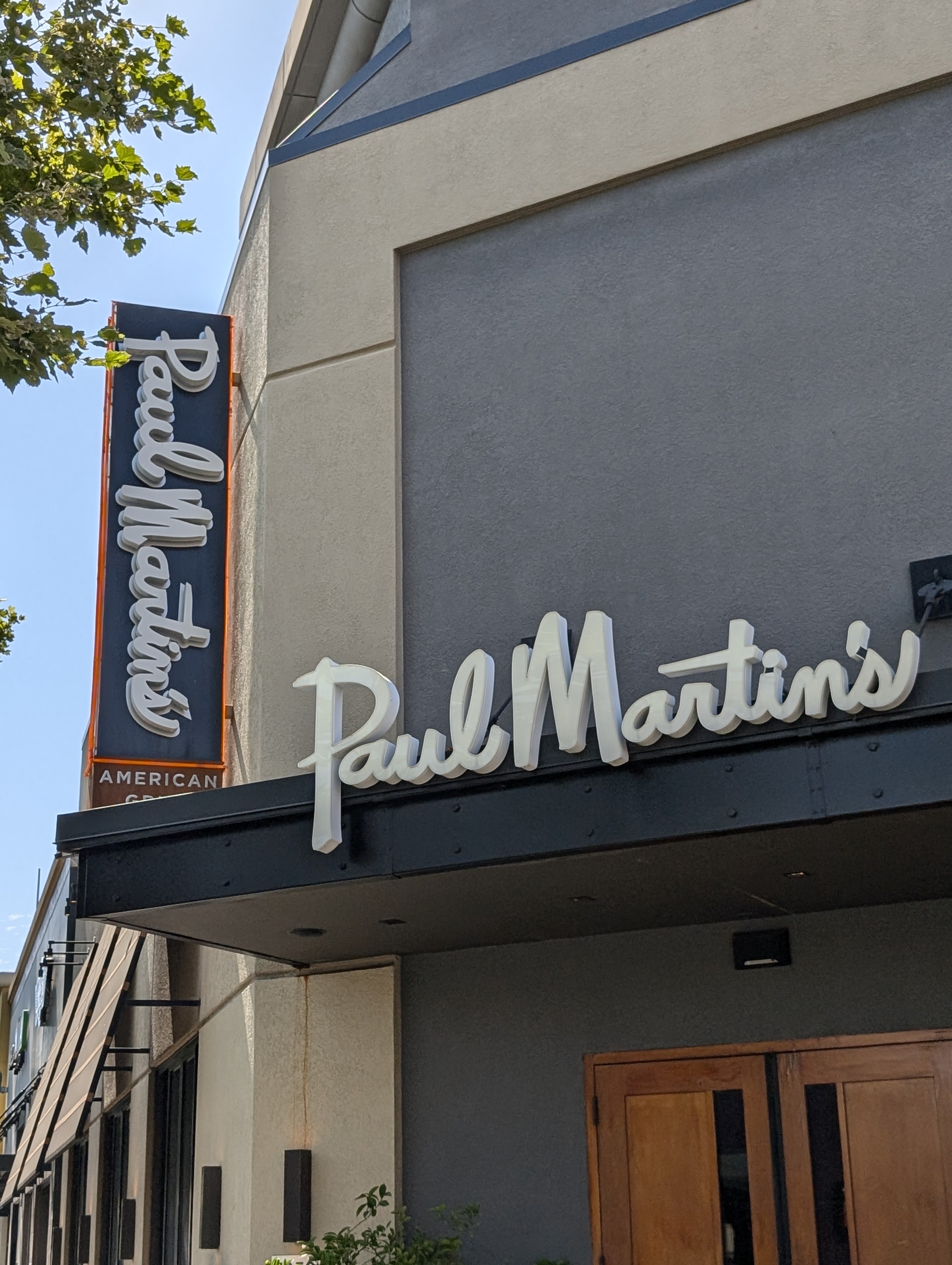 Paul Martin’s American Grill logo