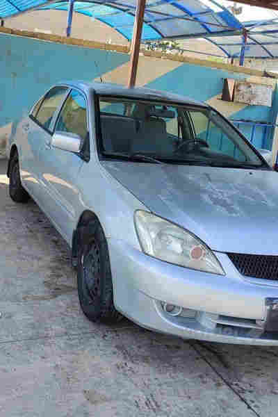 لانسەر 2009 گێڕ ئۆتۆماتیک