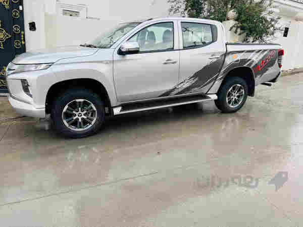 میستروبۆشی L200 2022 قەزافی یەک دەستە
