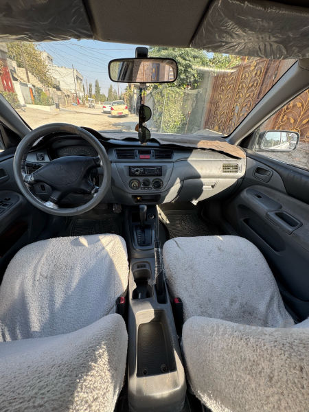 لانسەر2006تۆماتیک بێ بۆیاخ