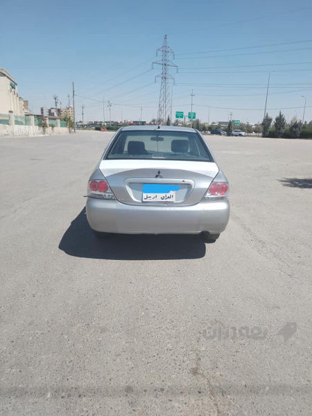 لانسەر مۆدیل 2009  - 2