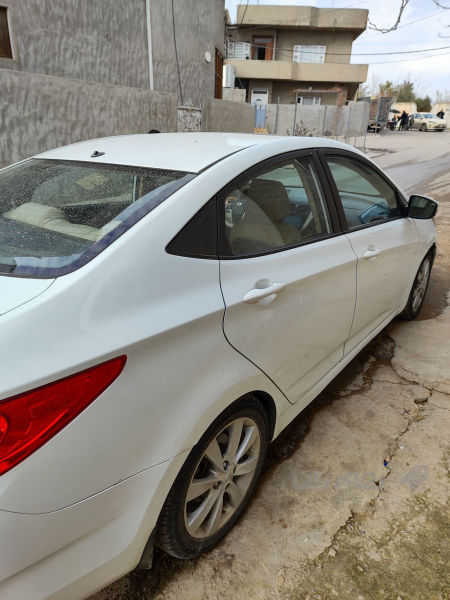 هۆندای ئەکسێنت 2014 تۆماتیک و سلاید و سوکان فۆلیۆم - 6