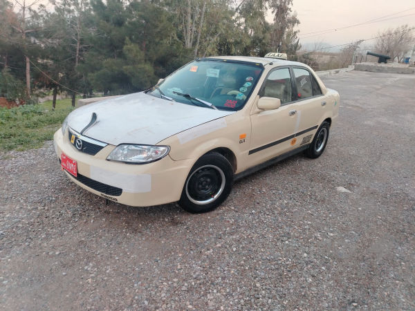 مازدا 323 ئارم بلاستيك و سنوي اسلي  - 2