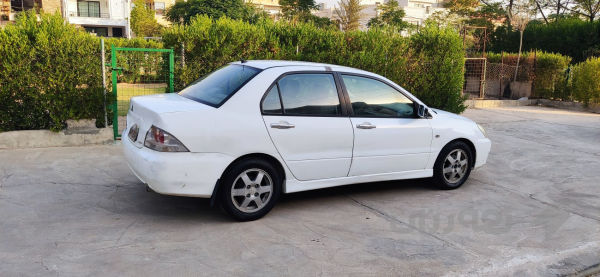 Mitsubishi lancer  - 3