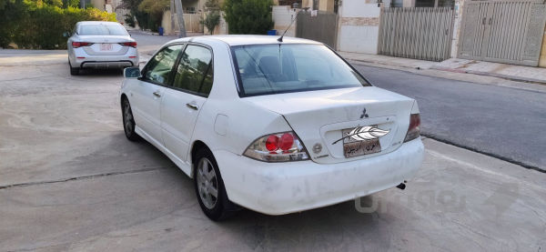 Mitsubishi lancer  - 4