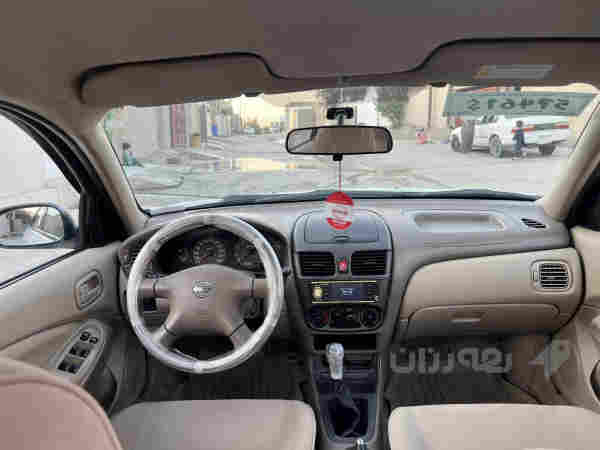 نيسان صني محرك أبيض موديل 2009  - 4