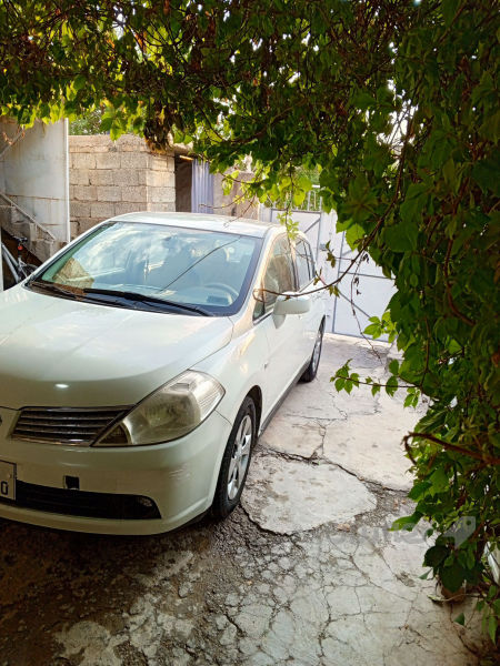 Nissan tida - 4
