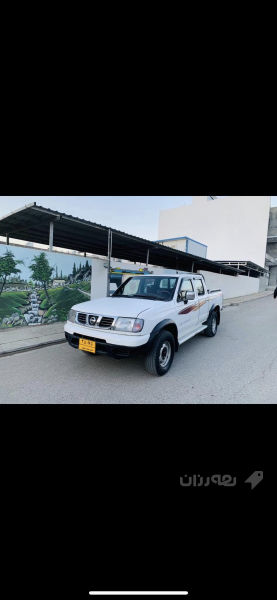 نیسان پیکاب دەبڵ ئەکسل 2004  - 2