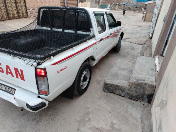 نيسان ده بل 2003 زيت ته بريد باوه ر  - 3