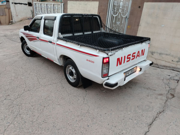 نيسان ده بل 2003 زيت ته بريد باوه ر  - 2